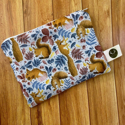 DIY Pouch Kit featuring adorable red squirrel designs.