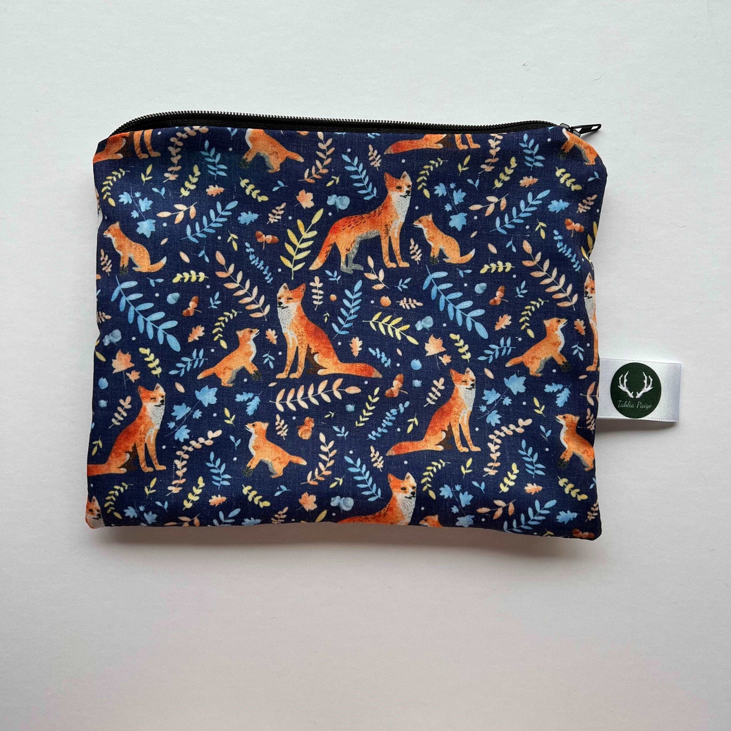 Cute fox pouch, perfect for storing essentials.