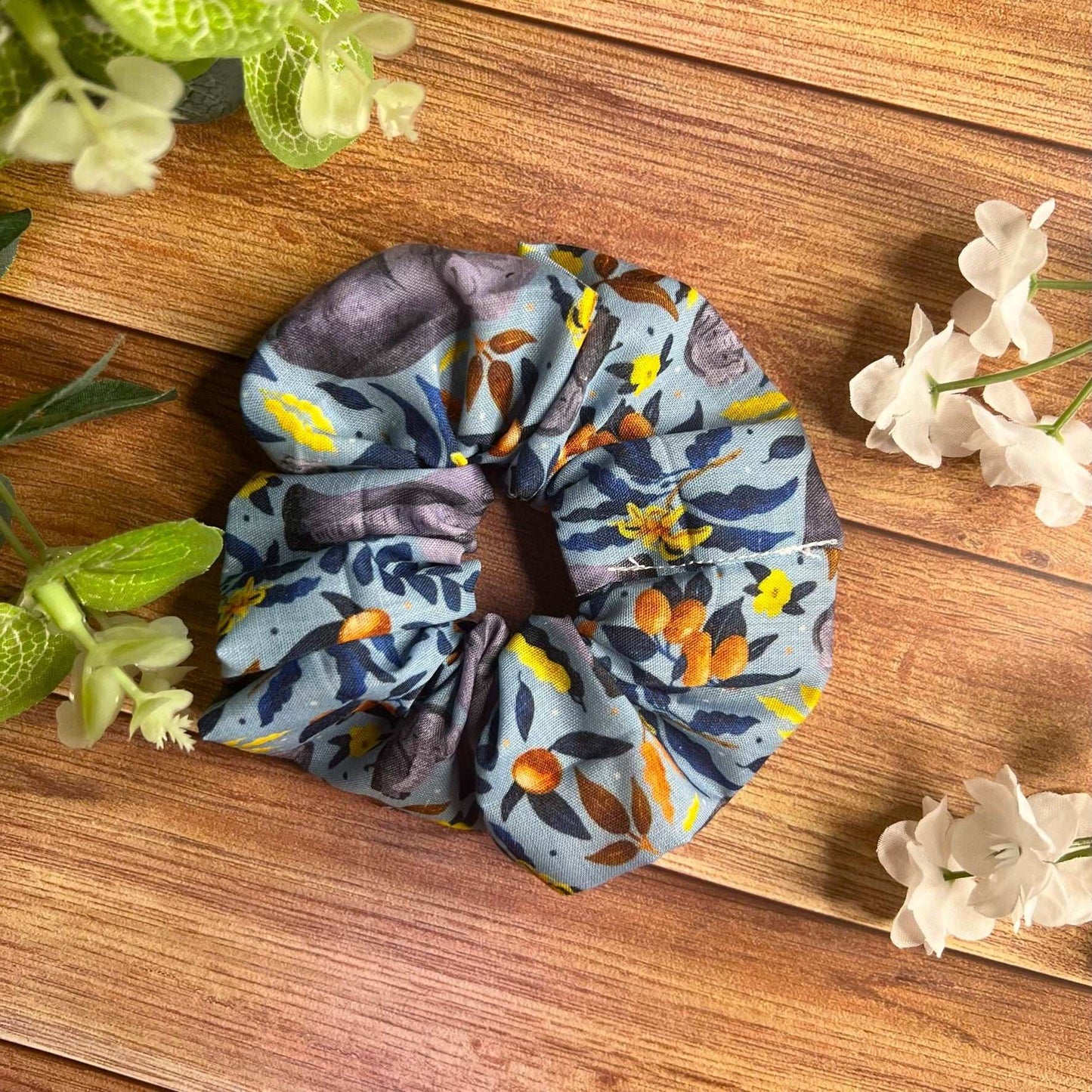 Stylish elephant scrunchie for any hair type.